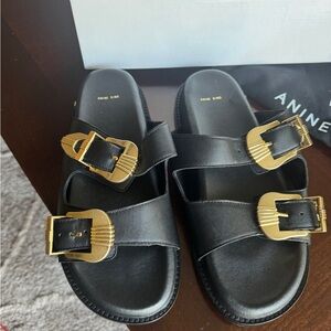 Anine Bing  Black Slide Sandals with Gold Buckles